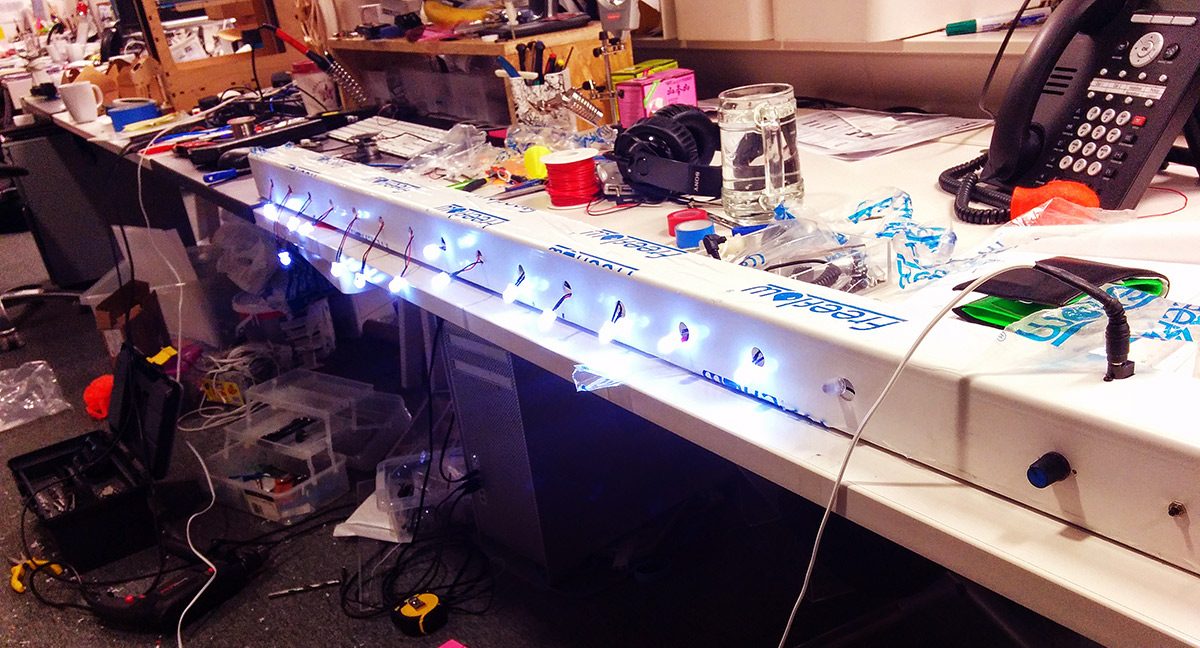 Gameshow timer lit up on the workbench mid-build
